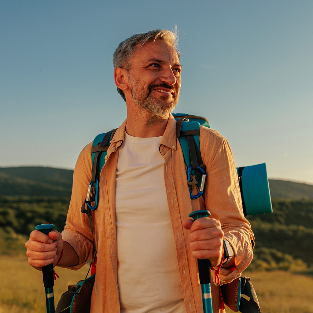 What is traveler's diarrhea and what are the symptoms?